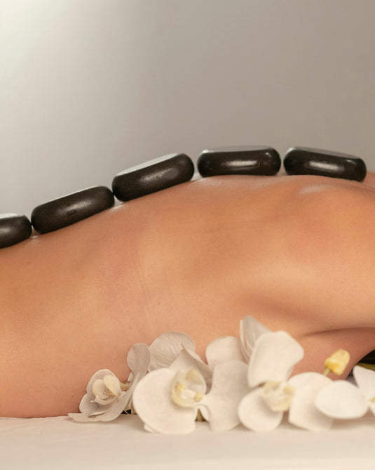 Massage & Recovery — hot stone massage