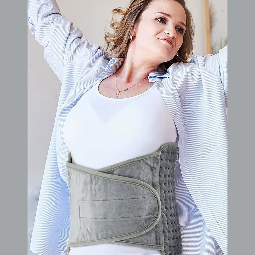 Warmtegordel gedragen om de onderrug